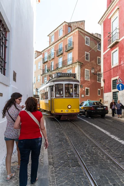 Traditional yellow and red tram — Stock Photo, Image
