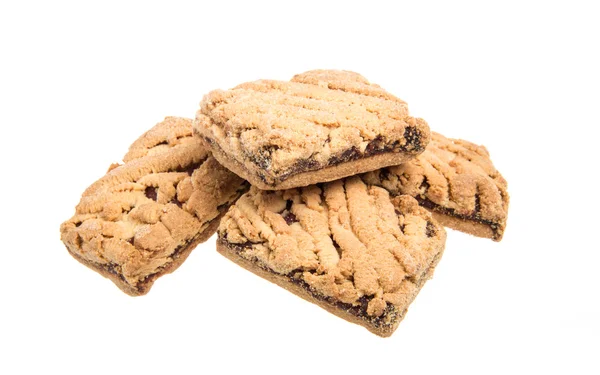 Montón de deliciosas galletas aisladas sobre fondo blanco — Foto de Stock