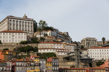 View of Porto city at the riverbank (Ribeira quarter) and wine b clipart