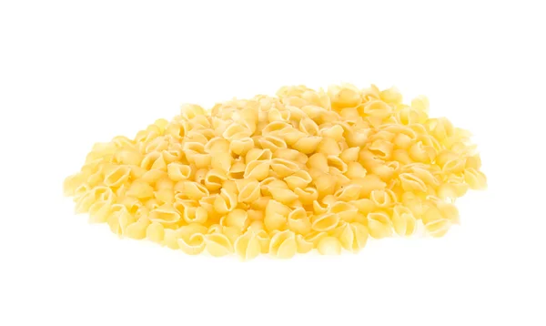 Högen av rå pasta (conchiglie) — Stockfoto