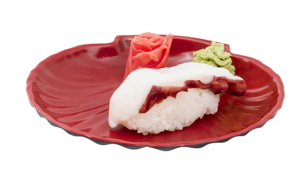 Sushi giapponese con polpo di carne su sfondo bianco — Foto Stock