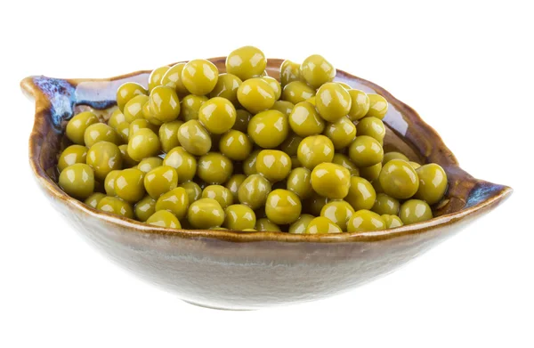 Guisantes verdes, en un tazón, aislado, fondo blanco —  Fotos de Stock