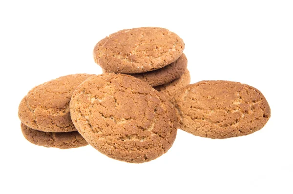 Haldy chutné cookies izolovaných na bílém pozadí — Stock fotografie