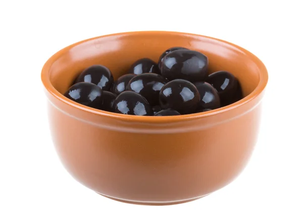 Olives black watered with olive oil in a bowl isolated on a whit — Stock Photo, Image