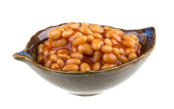 Marinated haricot beans in tomato sauce with shallots on a plate — Stock Photo, Image