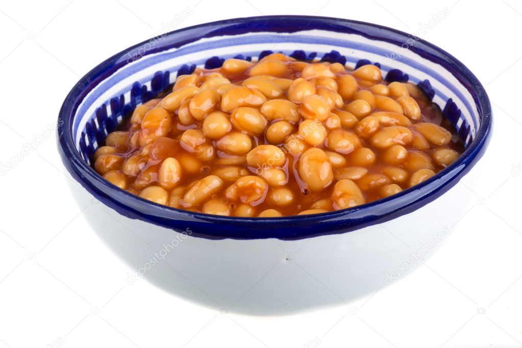 Marinated haricot beans in tomato sauce with shallots on a plate Stock Photo by ©AndreySt 16300835