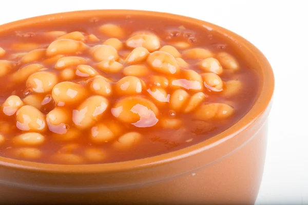 Marinated haricot beans in tomato sauce with shallots on a plate — Stock Photo, Image