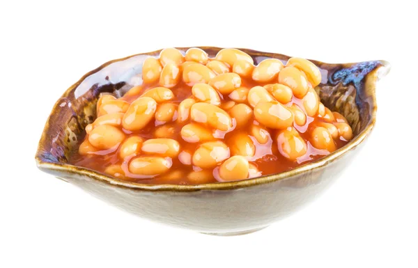 Marinated haricot beans in tomato sauce with shallots on a plate — Stock Photo, Image