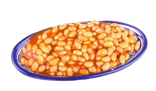 Marinated haricot beans in tomato sauce with shallots on a plate — Stock Photo, Image