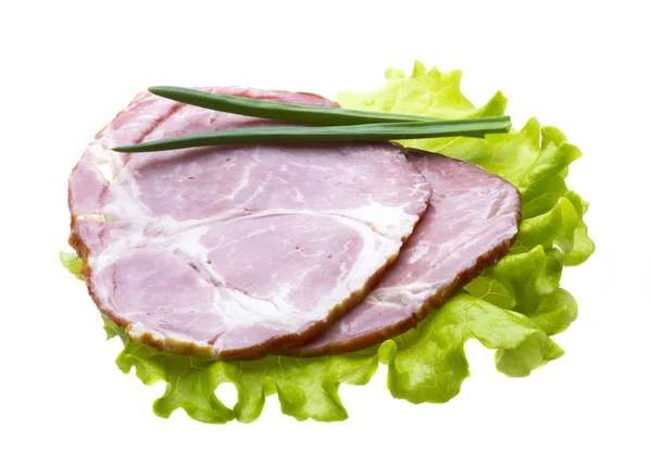 Bacon with salad leaves — Stock Photo, Image