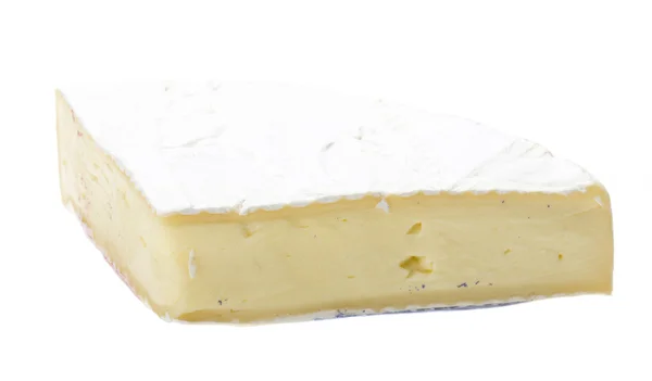 Un pezzo di formaggio brie morbido — Foto Stock