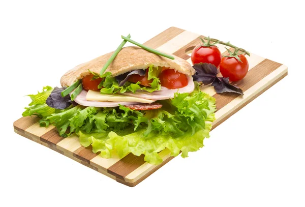 Bread with sausages and salad — Stock Photo, Image