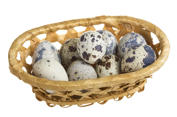 Quail eggs in a basket — Stock Photo, Image