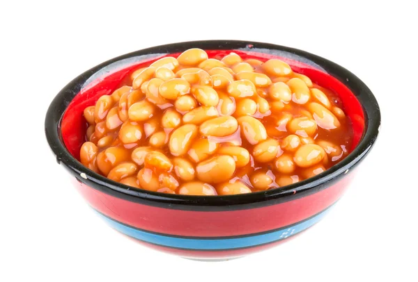 Marinated haricot beans in tomato sauce with shallots on a plate — Stock Photo, Image