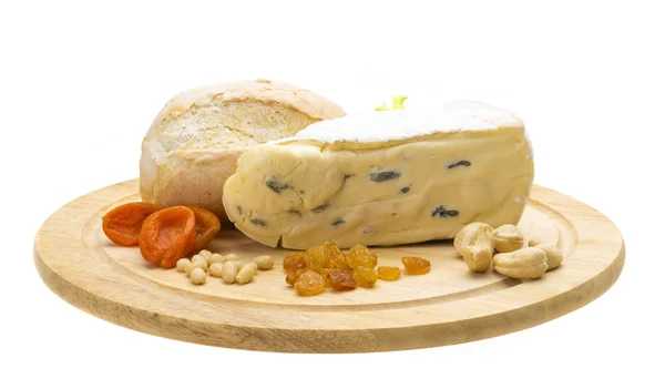 A piece of Brie cheese Royalty Free Stock Images