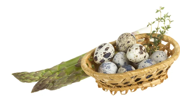 Quail eggs in a basket — Stock Photo, Image