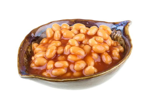 Marinated haricot beans in tomato sauce with shallots on a plate — Stock Photo, Image