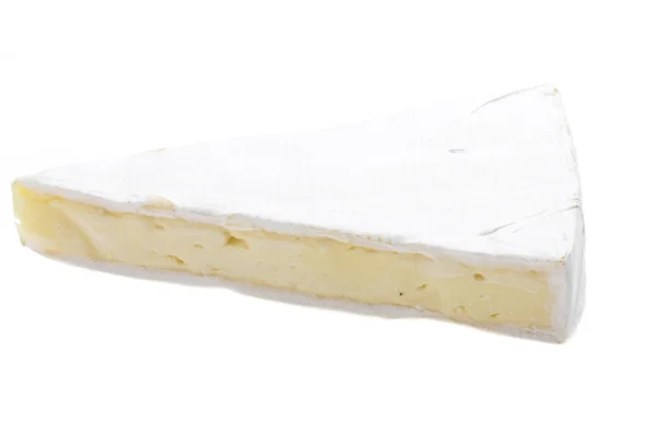 Un pezzo di formaggio brie morbido — Foto Stock