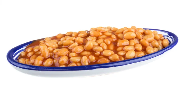 Marinated haricot beans in tomato sauce with shallots on a plate — Stock Photo, Image