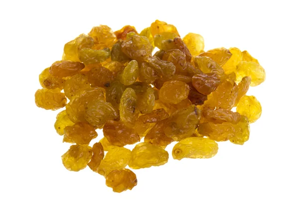 Golden raisins over white Stock Image