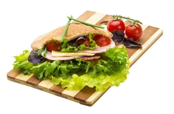 Bread with sausages and salad — Stock Photo, Image