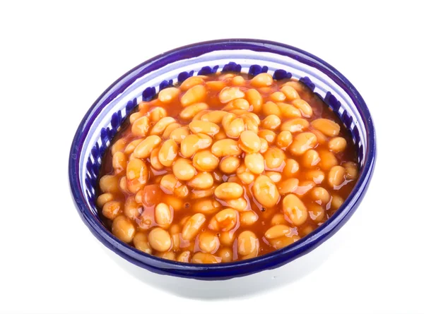 Marinated haricot beans in tomato sauce with shallots on a plate — Stock Photo, Image