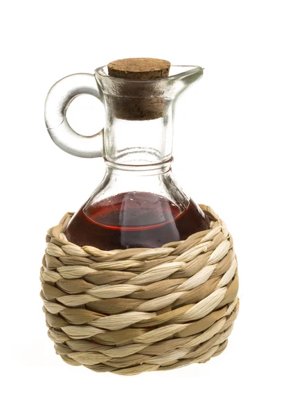 Small decanter with red wine vinegar isolated on the white — Stock Photo, Image