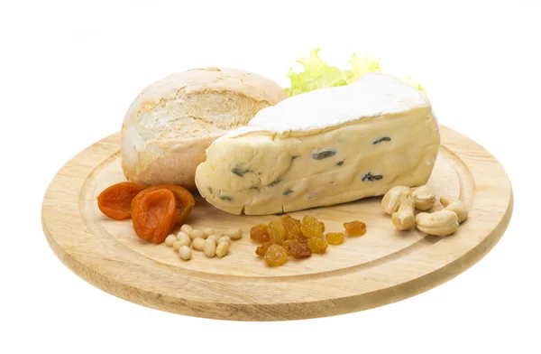 A piece of Brie cheese Stock Photo