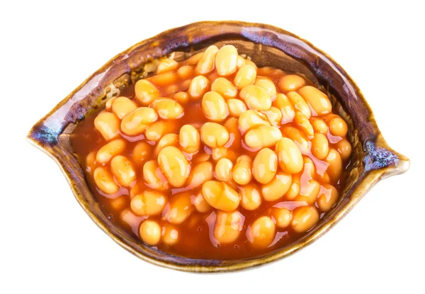 Marinovaný haricot fazole v rajčatové omáčce s šalotkou na talíři — Stock fotografie