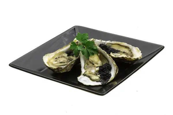 Oysters with black cavair — Stock Photo, Image