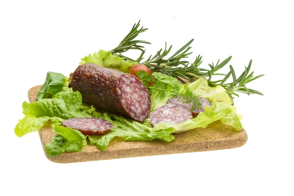 Salami med rosmarin, sallad och tomater — Stockfoto