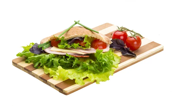 Bread with sausages and salad — Stock Photo, Image