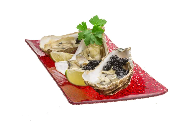 Austern mit schwarzem Kavair — Stockfoto