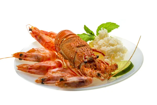 Spiny lobster, shrimps and rice — Stock Photo, Image