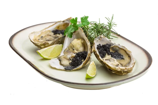 Oysters with black cavair — Stock Photo, Image