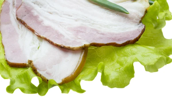 Bacon with salad leaves — Stock Photo, Image