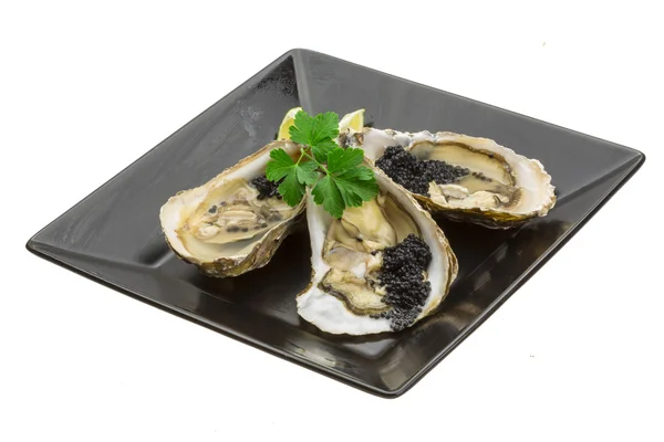 Oysters with black cavair — Stock Photo, Image