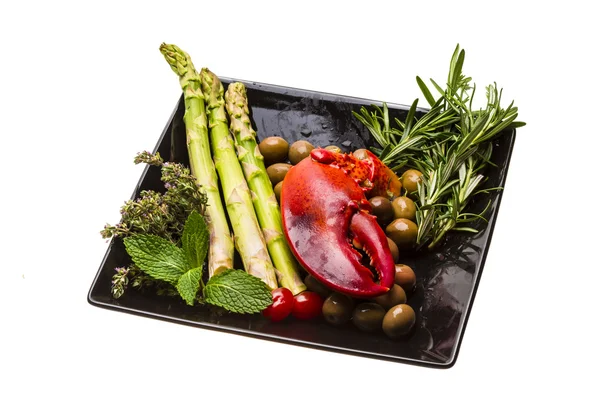 Lobster leg with salad and asparagus — Stock Photo, Image