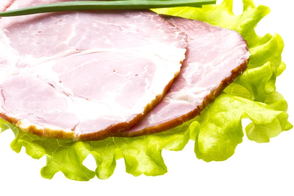 Bacon with salad leaves — Stock Photo, Image