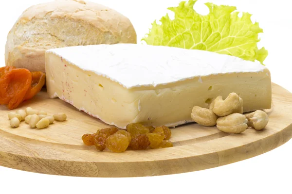 Trozo de queso Brie —  Fotos de Stock