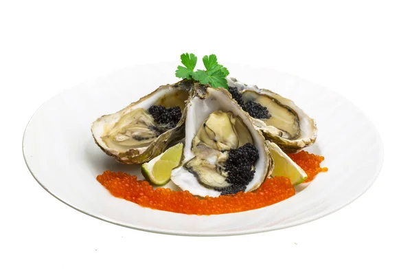 Oysters with black cavair — Stock Photo, Image