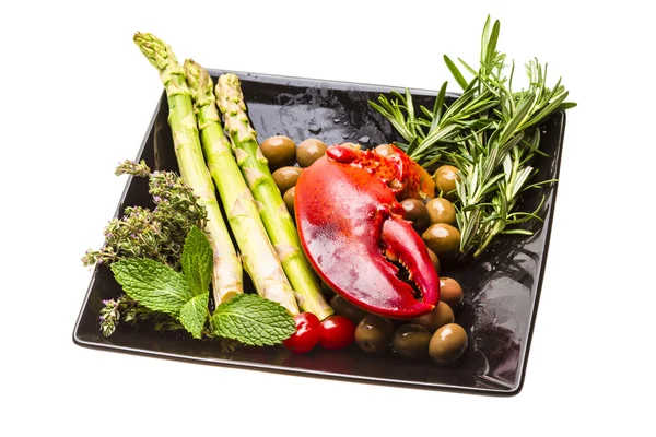 Lobster leg with salad and asparagus — Stock Photo, Image