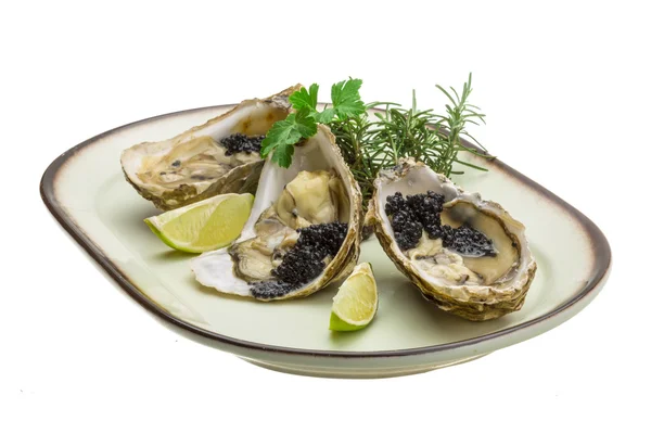 Oysters with black cavair — Stock Photo, Image