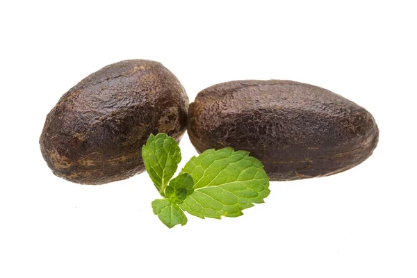 Nutmeg with mint — Stock Photo, Image