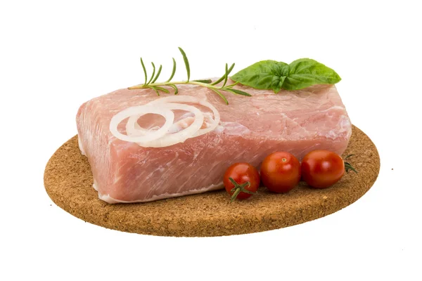 Raw pork with onion, basil and rosemary — Stock Photo, Image