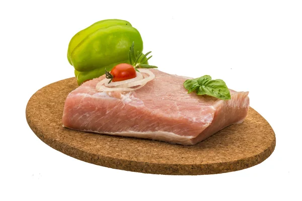 Raw pork with onion, basil and rosemary — Stock Photo, Image