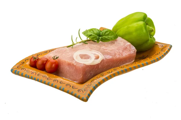 Raw pork with onion, basil and rosemary — Stock Photo, Image