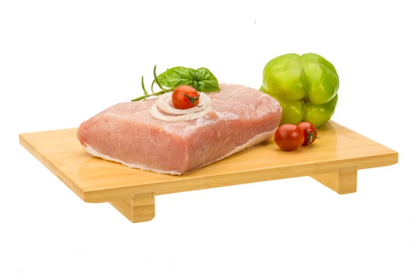 Raw pork with onion, basil and rosemary — Stock Photo, Image