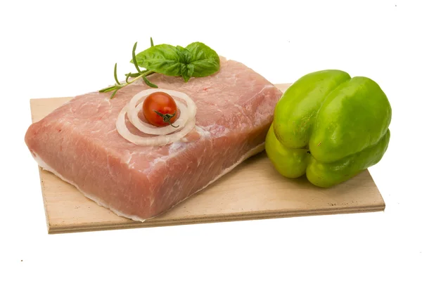 Raw pork with onion, basil and rosemary — Stock Photo, Image