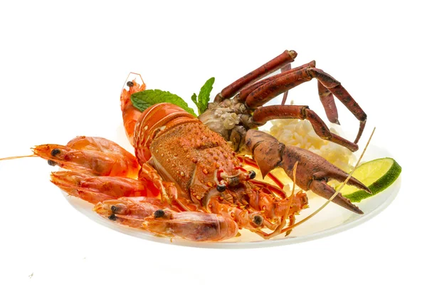 Lagosta espinhosa, camarões, pernas de caranguejo e arroz — Fotografia de Stock